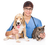 veterinarian hugging cat and dog. isolated on white background