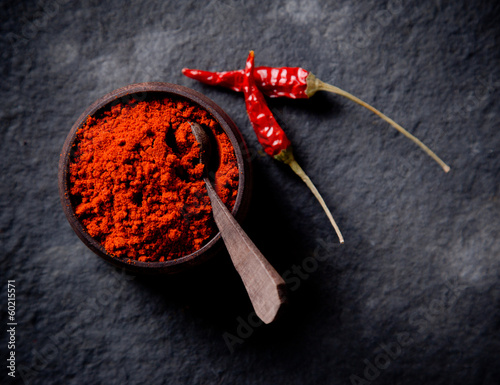 Photo Red pepper spices on stone background