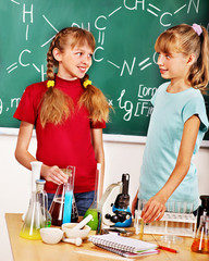 Wall Mural - Child in chemistry class.