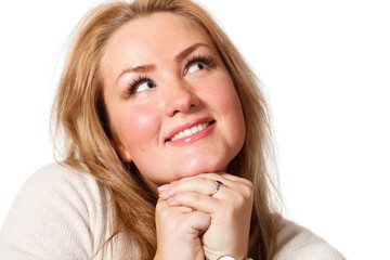 Young woman looking upwards.