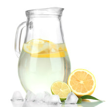 Cold Water With Lime, Lemon And Ice In Pitcher Isolated On