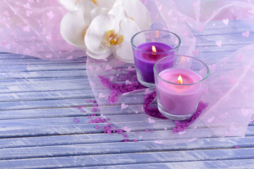 Wall Mural - Beautiful colorful candles and  orchid flowers,