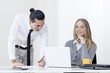 © angelo lano - Business people working on laptop