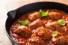 Meatballs With Tomato Sauce In Black Pan