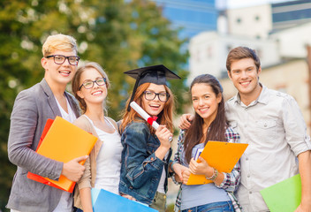 Wall Mural - students or teenagers with files and diploma