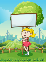 Poster - A young girl beside the empty wooden board at the hilltop