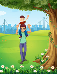 Poster - A father carrying his son near the tree across the buildings