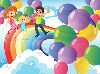 Poster - A happy family playing with the rainbow and the floating balloon