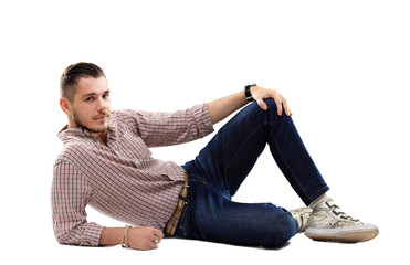 Wall Mural - Flirtatious man sitting on the floor