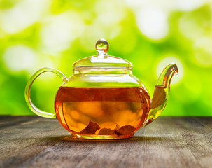 Sticker - Teapot of fresh tea on natural background