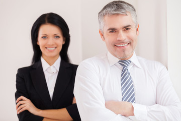 Wall Mural - Cheerful business colleagues.