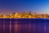 Fototapeta  - San Francisco sunset skyline California bay water reflection