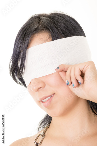 Fotografie, Obraz Portrait of a hispanic woman with white blindfold