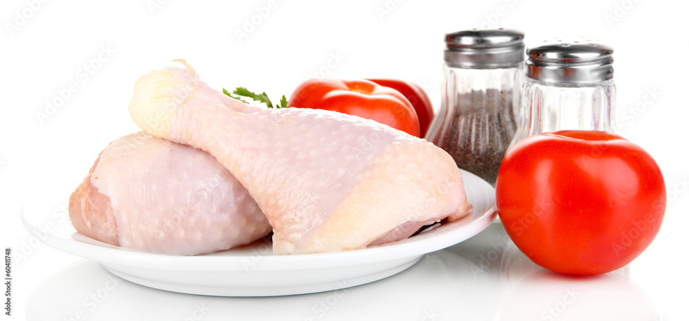 Raw chicken legs isolated on white