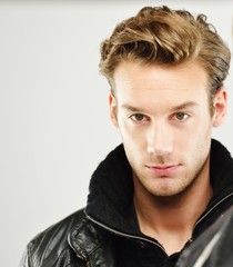 Young man studio shoot posing closeup