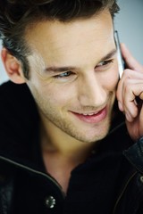 Wall Mural - Young man studio shoot posing closeup