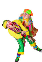 Two Smiling Clowns Isolated Over A White Background