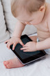 baby with a tablet
