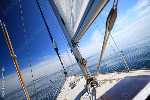 Obraz w ramie Sailboat yacht sailing in blue sea. Tourism