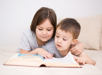 Children is reading book