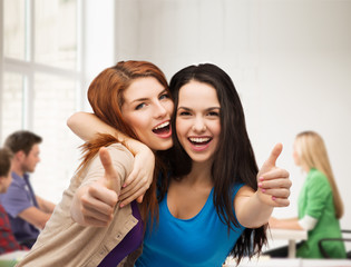 Sticker - two smiling girls showing thumbs up