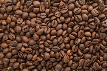 Wall Mural - Close-up of coffee beans texture to use as background