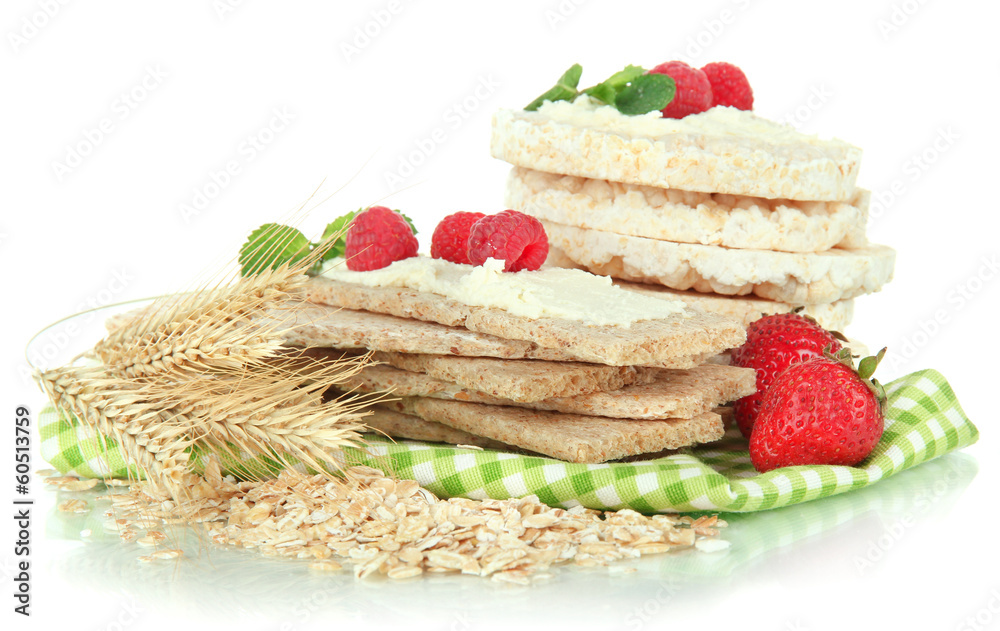 Tasty crispbread with berries, isolated on white