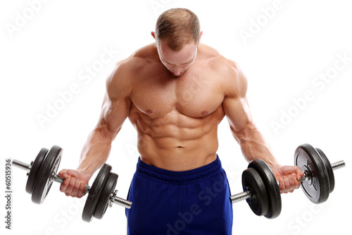 Fotografie, Obraz Bodybuilding. Strong man with a dumbbell