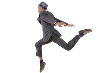 young black businessman leaping / jumping high