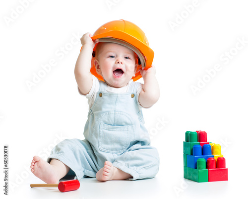Fototapeta baby playing with building blocks toy