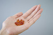 © mnimage - Diet supplements on the palm