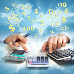 Aufkleber - Hands of business people with calculator.