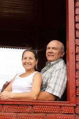 Wall Mural - elderly couple on the porch