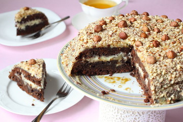 Vegetarian chocolate cake with buttercream and nuts