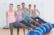 © WavebreakmediaMicro - Fitness class with exercise balls at fitness studio