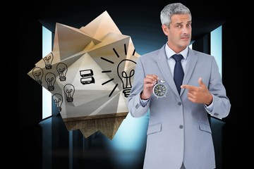 Poster - Composite image of businessman holding alarm clock