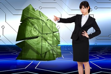 Aufkleber - Composite image of focused businesswoman pointing