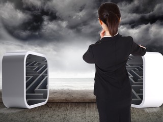Poster - Composite image of thoughtful businesswoman pointing