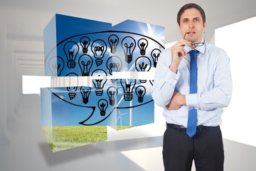 Poster - Composite image of thinking businessman biting glasses