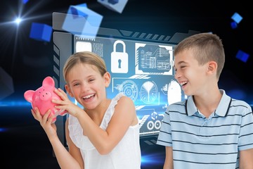 Poster - Composite image of smiling young girl holding piggy bank