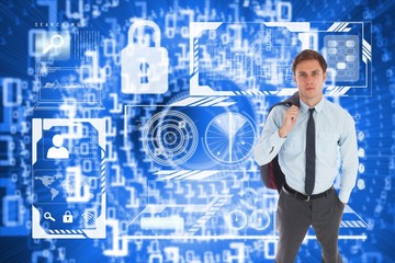 Poster - Composite image of serious businessman holding his jacket