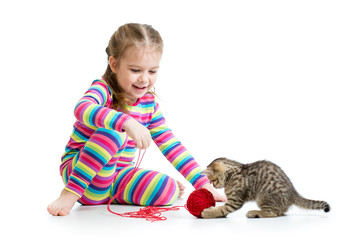 Poster - child girl playing with kitten isolated on white background