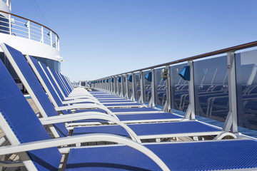 Wall Mural - Lounge chairs on deck of luxury cruise ship