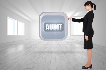 Poster - Composite image of businesswoman pointing