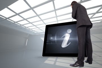 Poster - Composite image of thinking businessman touching chin