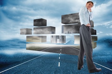Poster - Composite image of thinking businessman with hand on head