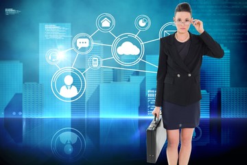 Poster - Composite image of elegant businesswoman in suit carrying briefc