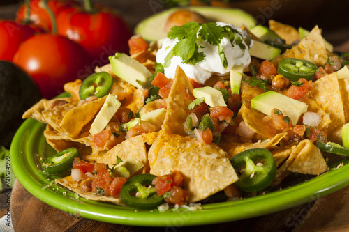 Cuadros en Lienzo Homemade Unhealthy Nachos with Cheese and Vegetables
