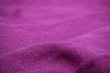 pink linen texture for background, selective focus