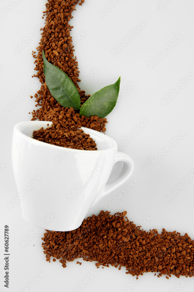 Cup with instant coffee isolated on white
